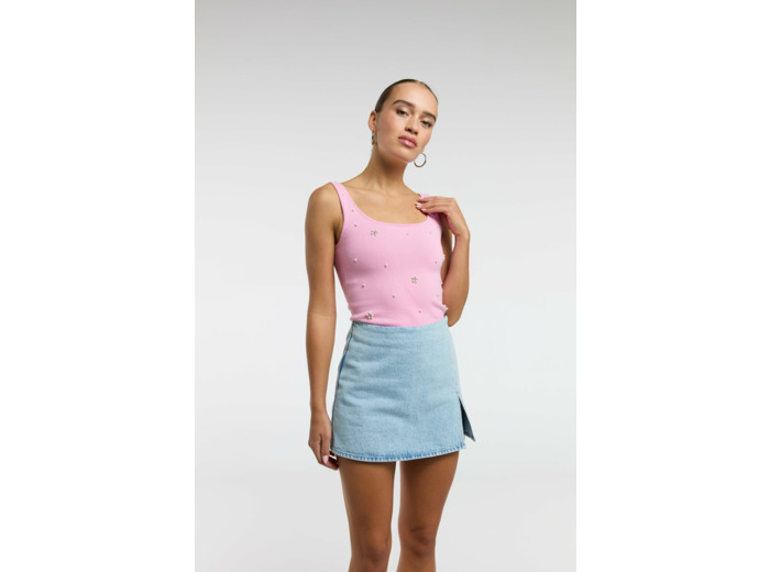 Top en tricot avec applications